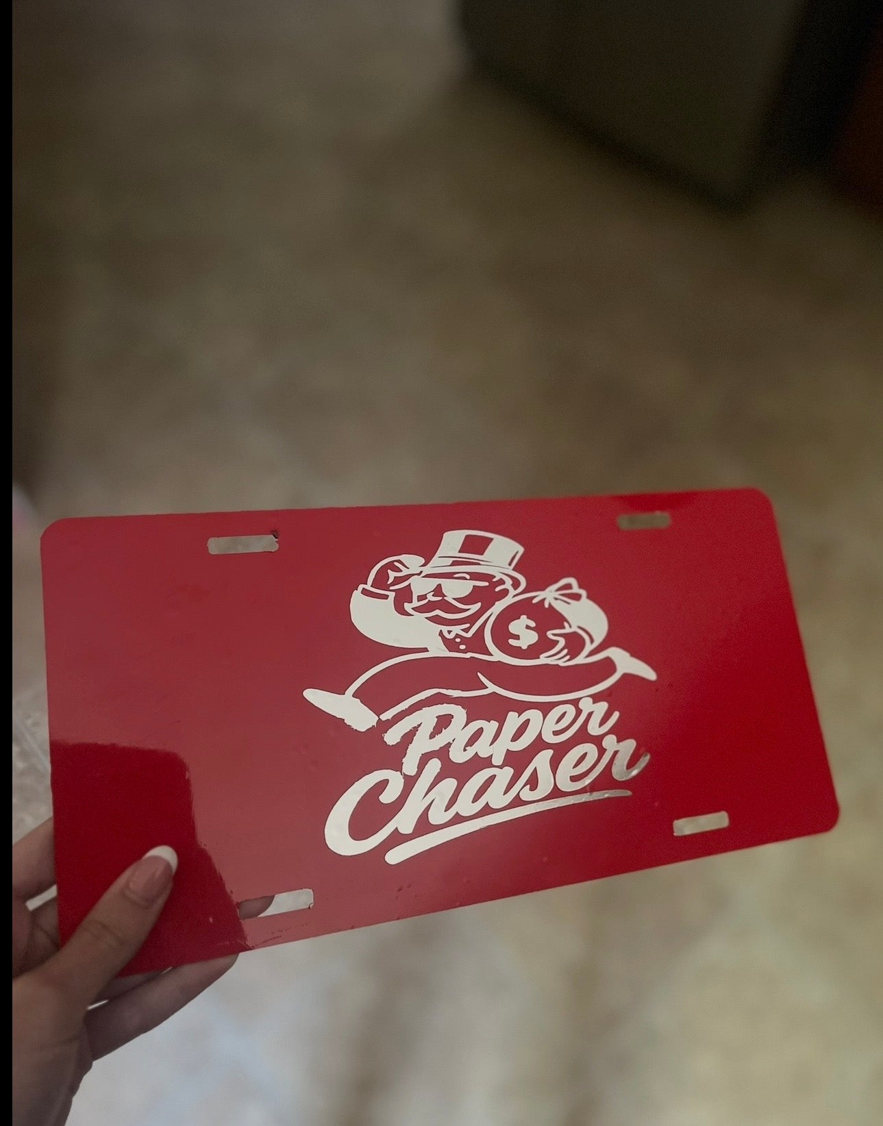 “Paper Chaser” License Plate